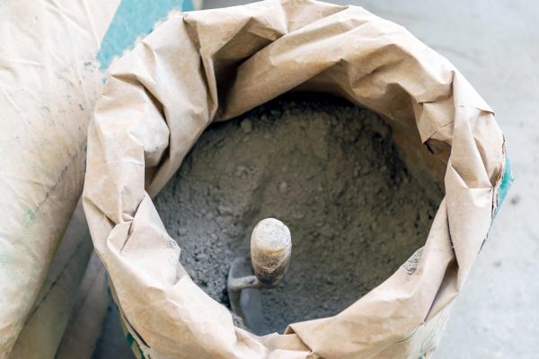 tci - cement bag and trowel tci - cement bag and trowel