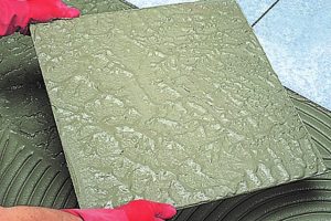 NEW FAST-SETTING TILE ADHESIVE AND SMOOTHING COMPOUND1