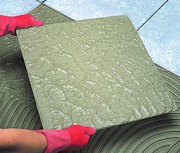 NEW FAST-SETTING TILE ADHESIVE AND SMOOTHING COMPOUND1 NEW FAST-SETTING TILE ADHESIVE AND SMOOTHING COMPOUND1