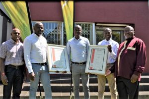 Building Rolle village one brick