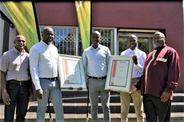 Building Rolle village one brick