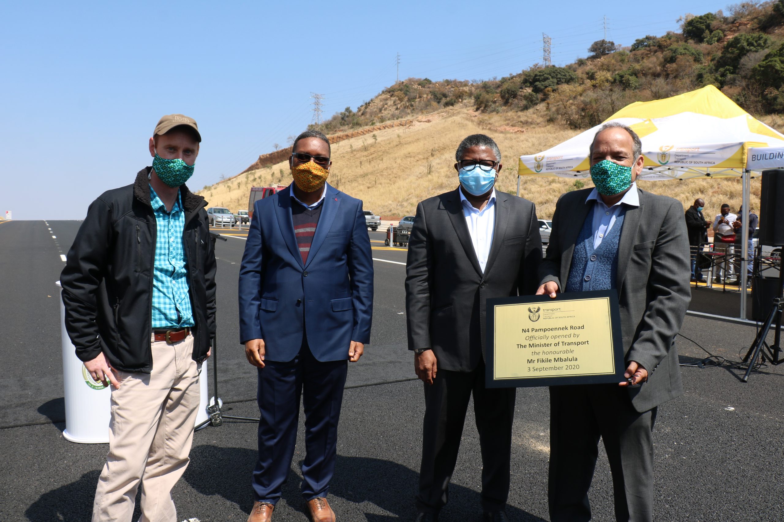 hendrik-louw-philip-hendricks-and-zutari-cfo-joe-ndala-with-transport-minister-fikile-mbalula