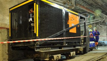 Converted Electric Compressor enclosed in rugged cage for underground mine
